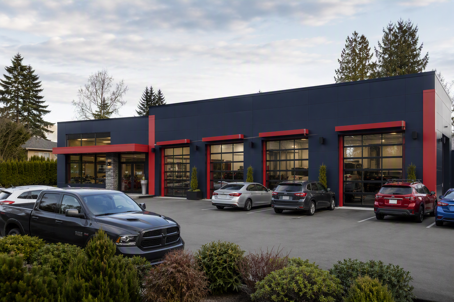 Modern automotive service shop exterior with multiple repair bays in Langley